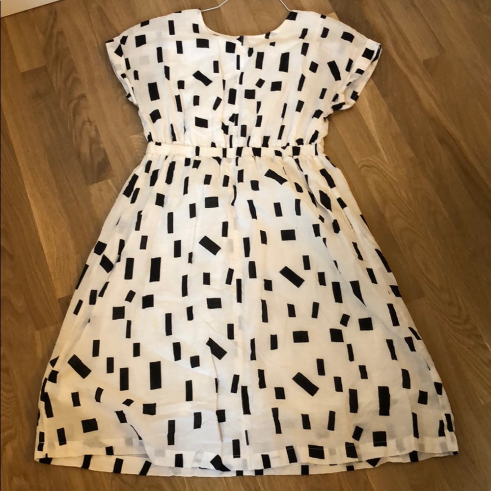 MO:VINT White Midi dress with capped sleeves.